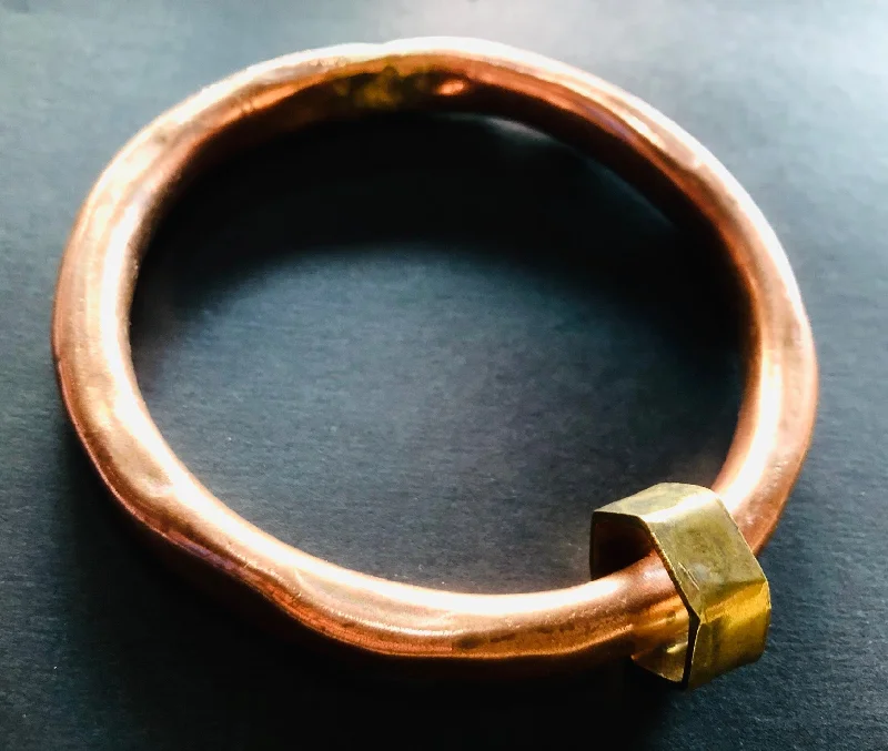 Ladies large gemstone bangles-Copper anvil bangle with brass shape