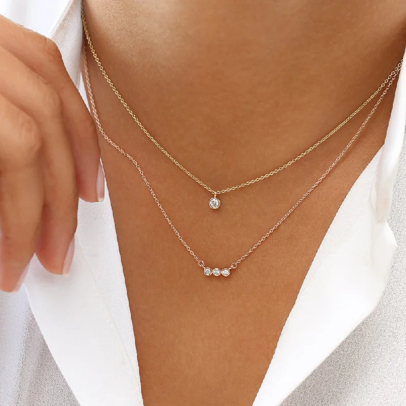 Ladies simple gold necklaces-18K Gold Trio Bezel Diamond Necklace