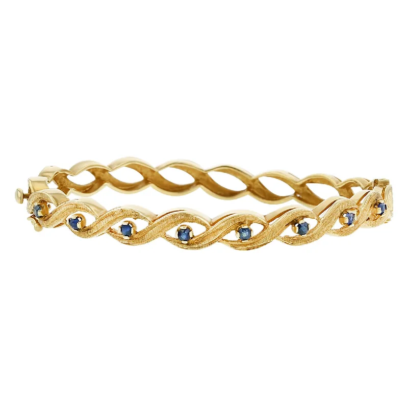 Ladies adjustable bracelets-14K Yellow Gold Blue Sapphire Twisted Bangle