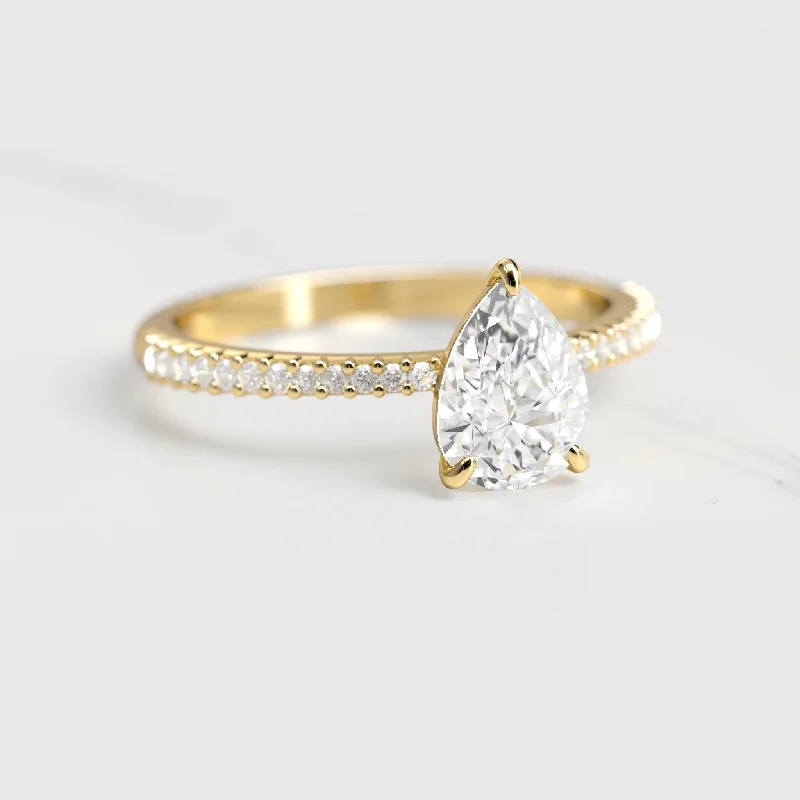 Ladies bands with diamonds-Pear Half Pave Tapered Moissanite Ring