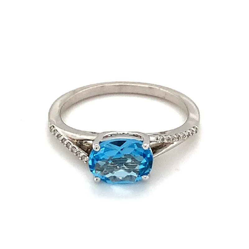 Ladies infinity rings-14k White Gold Oval Blue Topaz Ring